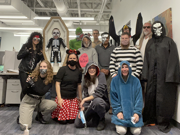 Redona team group shot in Halloween costumes
